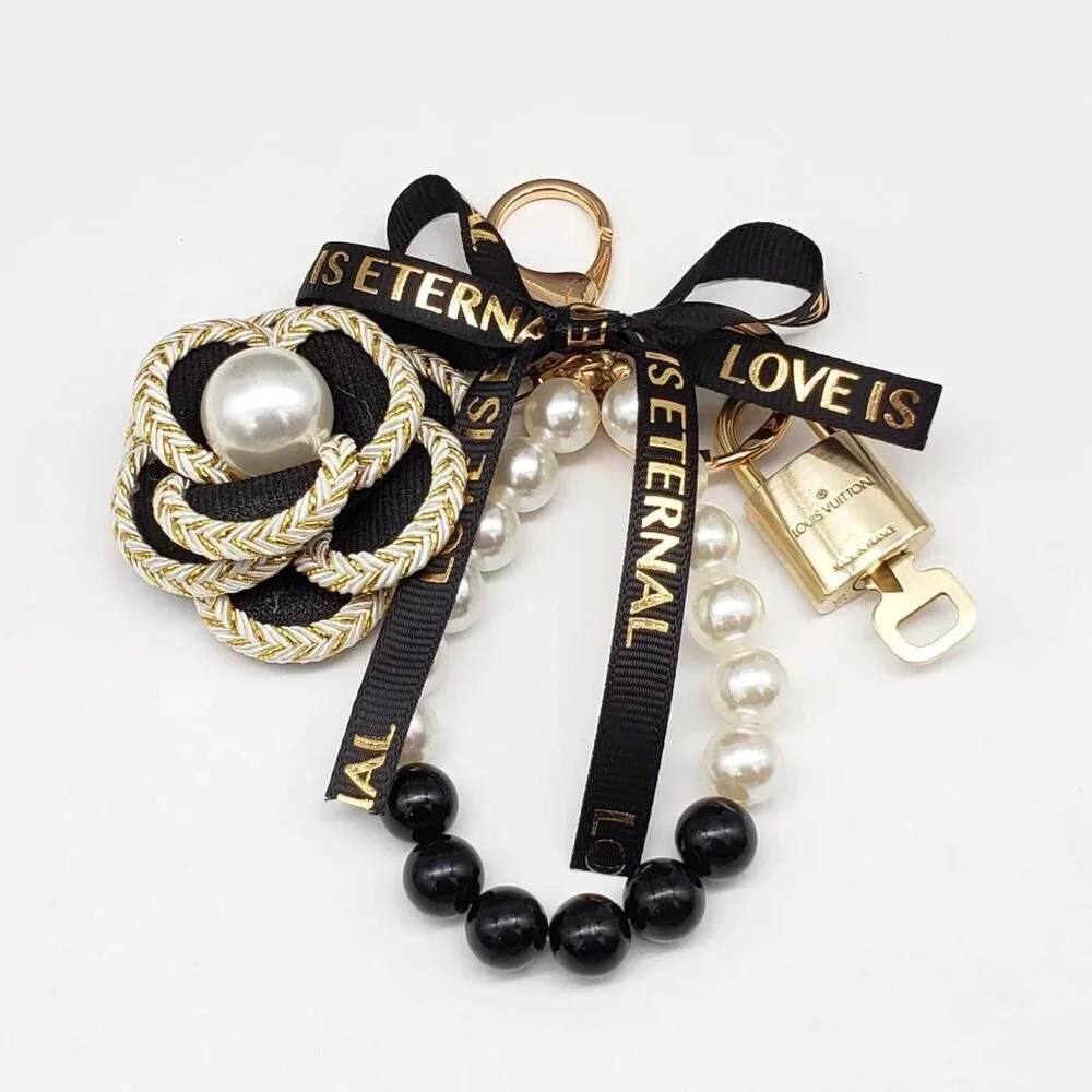 Authentic Louis Vuitton Lock & Key with unbranded flower Bagcharm, Keycharm
